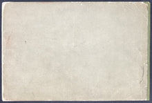 Load image into Gallery viewer, Rear wrapper view illustrating the original gray paper texture and superficial edge rubbing