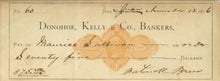 Load image into Gallery viewer, Hand-inked banking check with standard printed text fields showing a physical pen signature on the lower right line.