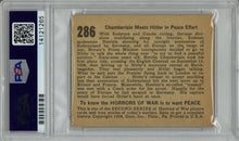 Load image into Gallery viewer, Reverse side view of the PSA graded card showing the landscape layout of the historical narrative text and the famous anti-war slogan
