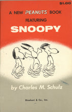 Load image into Gallery viewer, Front cover of the book A New Peanuts Book Featuring Snoopy, showing a color pictorial illustration of Snoopy on stiff paper wrappers.