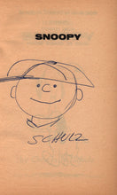 Load image into Gallery viewer, A New Peanuts Book Featuring Snoopy. [Signed by Schulz With an Original Sketch of Charlie Brown]
