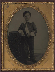 A Superb, Quarter Plate Ambrotype Photograph of a Young Boy with Subtle Hand-Tinting and Embellishing