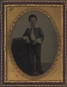 A Superb, Quarter Plate Ambrotype Photograph of a Young Boy with Subtle Hand-Tinting and Embellishing